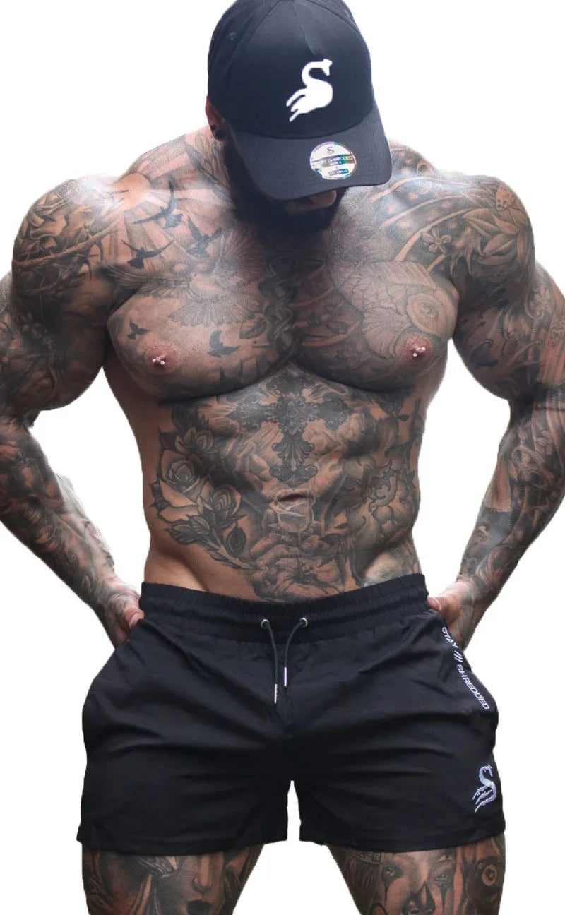 Men's Shorts Sweatpants Hipster Three-quarter Pants Muscle Fitness Summer Running Training Quick-drying Breathable Stretch Pants
